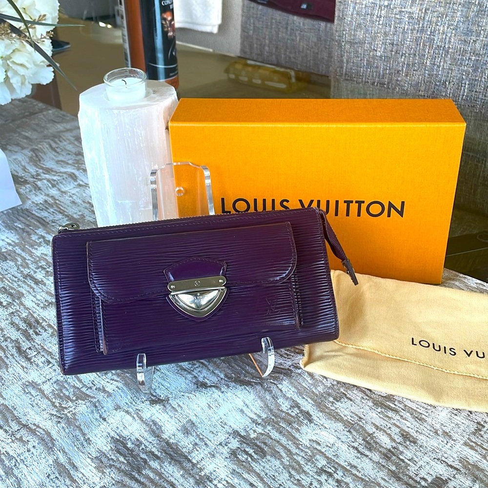 Beautiful purple LV epi wallet/ clutch in a dust bag Box  not Included
